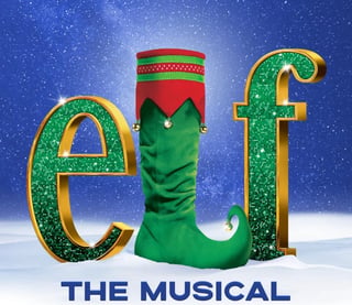 Colorful logo for Elf the Musical featuring green and gold letters with an elf boot character against a snowy blue background